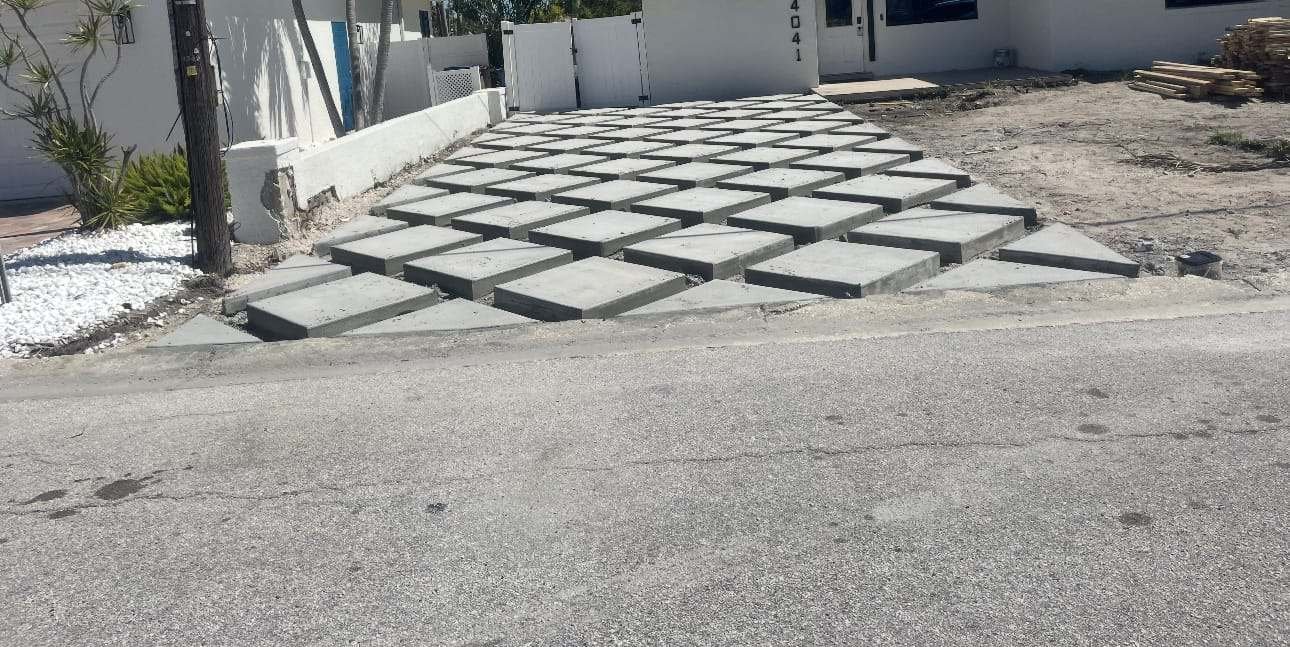 Pavers set in a grid with artificial turf joints