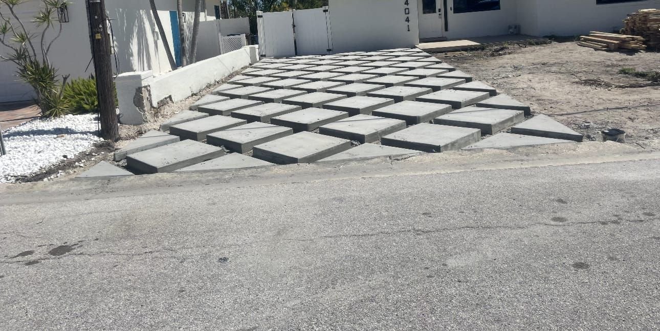 Pavers set in a grid with artificial turf joints