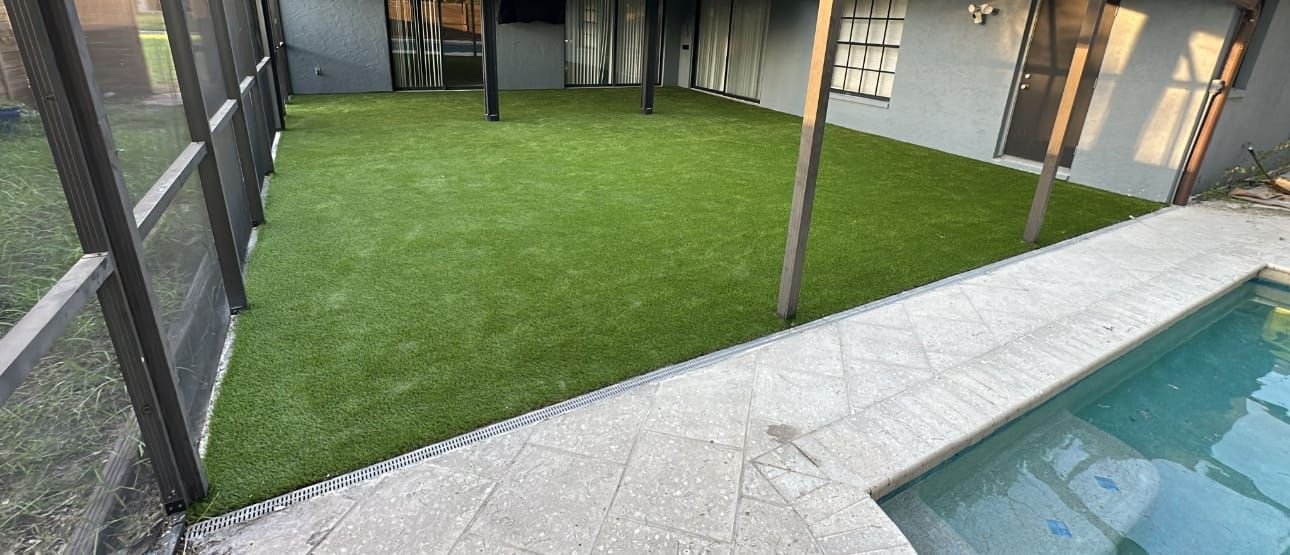 Paver pool deck with artificial turf